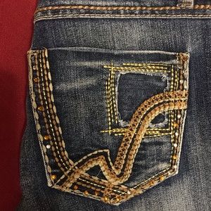 NWOT Flared low rise jeans with cute bling details